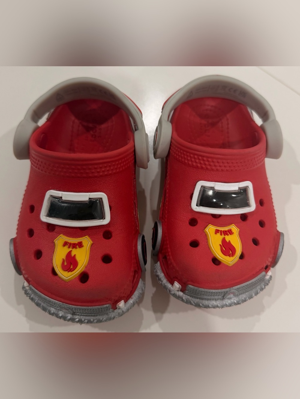 CROCS Kids Red Foam Clogs with Fire Badge and Gray Accents